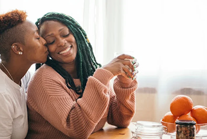 Marriage-Counseling4 Couple kissing at tabl