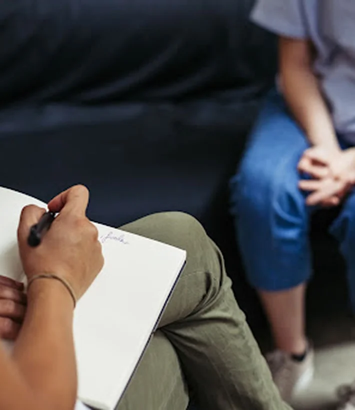Therapist taking notes