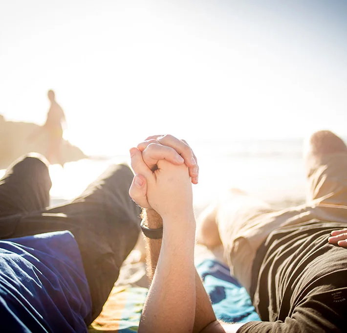 couples-counseling2 Couple holding hands on beach