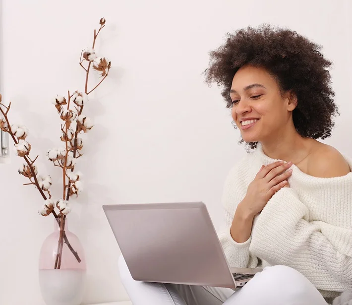online-counseling1 Woman video chatting on laptop
