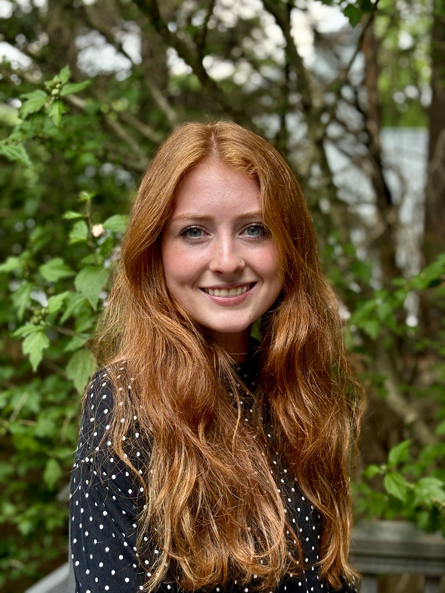 Smiling woman with red hair