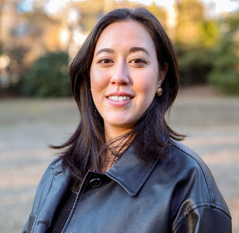 Smiling woman in black jacket