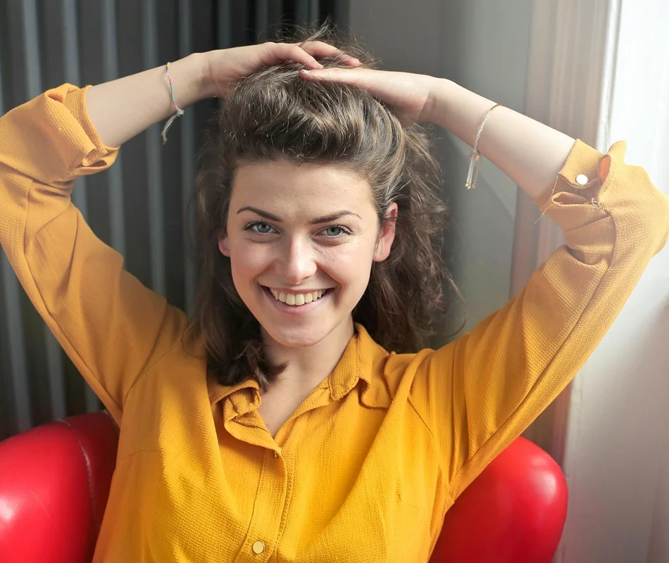 Rekindle your excitement Woman touching her hair